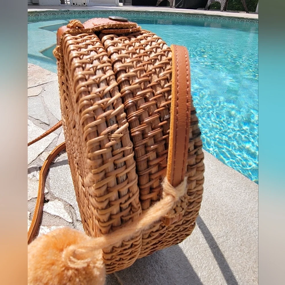 BOHO Round Woven Rattan Crossbody Bag with Pom-Pom Details - Picture 3 of 9